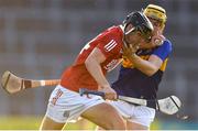 20 July 2021; Padraig Power of Cork in action against Conor O'Dwyer of Tipperary during the Munster GAA Hurling U20 Championship semi-final match between Tipperary and Cork at Semple Stadium in Thurles, Tipperary. Photo by Ben McShane/Sportsfile