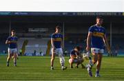 20 July 2021; Johnny Ryan, right, leads his Tipperary team-mates off the pitch after their defeat in the Munster GAA Hurling U20 Championship semi-final match between Tipperary and Cork at Semple Stadium in Thurles, Tipperary. Photo by Ben McShane/Sportsfile