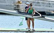 21 July 2021; Team Ireland Women's Four reserve rower Tara Hanlon carries her boat after training at the Sea Forest Waterway ahead of the start of the 2020 Tokyo Summer Olympic Games in Tokyo, Japan. Photo by Brendan Moran/Sportsfile