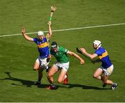 18 July 2021; Gearoid Hegarty of Limerick in action against David Reidy, left, and Diarmaid Byrnes of Limerick during the Munster GAA Hurling Senior Championship Final match between Limerick and Tipperary at Páirc Uí Chaoimh in Cork. Photo by Ray McManus/Sportsfile