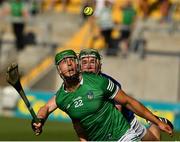 18 July 2021; Robbie Hanley of Limerick is tackled by Paddy Cadell of Tipperary during the Munster GAA Hurling Senior Championship Final match between Limerick and Tipperary at Páirc Uí Chaoimh in Cork. Photo by Ray McManus/Sportsfile