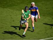 18 July 2021; Diarmaid Byrnes of Limerick and Séamus Kennedy of Tipperary during the Munster GAA Hurling Senior Championship Final match between Limerick and Tipperary at Páirc Uí Chaoimh in Cork. Photo by Ray McManus/Sportsfile