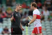 11 July 2021; Derry manager Rory Gallagher and Padraig Cassidy, right, before the Ulster GAA Football Senior Championship Quarter-Final match between Derry and Donegal at Páirc MacCumhaill in Ballybofey, Donegal. Photo by Stephen McCarthy/Sportsfile