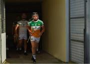 21 July 2021; Offaly captain Cathal King leads his side out before the Electric Ireland Leinster GAA Minor Hurling Championship Semi-Final match between Kilkenny and Offaly at UPMC Nowlan Park in Kilkenny. Photo by Eóin Noonan/Sportsfile