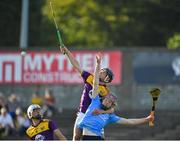 21 July 2021; Cian Ó Tuama of Wexford in action against Diarmuid Ó Dúlaing of Dublin during the Electric Ireland Leinster GAA Minor Hurling Championship Semi-Final match between Dublin and Wexford at Chadwicks Wexford Park in Wexford. Photo by Daire Brennan/Sportsfile