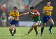 21 July 2021; Daire Cregg of Roscommon in action against Conor Dunleavy of Mayo during the EirGrid Connacht GAA Football U20 Championship Final match between Mayo and Roscommon at Elverys MacHale Park in Castlebar, Mayo. Photo by Piaras Ó Mídheach/Sportsfile
