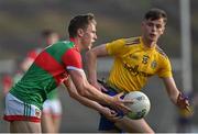 21 July 2021; Aidan Cosgrove of Mayo in action against Darragh Heneghan of Roscommon during the EirGrid Connacht GAA Football U20 Championship Final match between Mayo and Roscommon at Elverys MacHale Park in Castlebar, Mayo. Photo by Piaras Ó Mídheach/Sportsfile