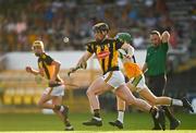 21 July 2021; Evan Rudkins of Kilkenny in action against Adam Screeney of Offaly during the Electric Ireland Leinster GAA Minor Hurling Championship Semi-Final match between Kilkenny and Offaly at UPMC Nowlan Park in Kilkenny. Photo by Eóin Noonan/Sportsfile
