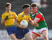 21 July 2021; Patrick Gavin of Roscommon in action against Conor Flynn of Mayo during the EirGrid Connacht GAA Football U20 Championship Final match between Mayo and Roscommon at Elverys MacHale Park in Castlebar, Mayo. Photo by Piaras Ó Mídheach/Sportsfile