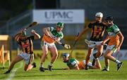 21 July 2021; Jeff Neary of Kilkenny is tackled by Andrew Coakley of Offaly during the Electric Ireland Leinster GAA Minor Hurling Championship Semi-Final match between Kilkenny and Offaly at UPMC Nowlan Park in Kilkenny. Photo by Eóin Noonan/Sportsfile