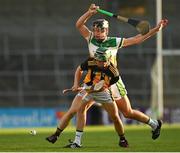 21 July 2021; Jeff Neary of Kilkenny in action against Dan Ravenhill of Offaly during the Electric Ireland Leinster GAA Minor Hurling Championship Semi-Final match between Kilkenny and Offaly at UPMC Nowlan Park in Kilkenny. Photo by Eóin Noonan/Sportsfile
