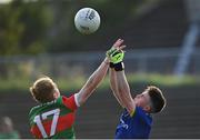 21 July 2021; Roscommon goalkeeper Conor Carroll in action against Paddy Heneghan of Mayo during the EirGrid Connacht GAA Football U20 Championship Final match between Mayo and Roscommon at Elverys MacHale Park in Castlebar, Mayo. Photo by Piaras Ó Mídheach/Sportsfile