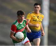 21 July 2021; Frank Irwin of Mayo gets past Ruaidhrí Fallon of Roscommon during the EirGrid Connacht GAA Football U20 Championship Final match between Mayo and Roscommon at Elverys MacHale Park in Castlebar, Mayo. Photo by Piaras Ó Mídheach/Sportsfile