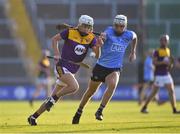 21 July 2021; Cillian Byrne of Wexford in action against David Lucey of Dublin during the Electric Ireland Leinster GAA Minor Hurling Championship Semi-Final match between Dublin and Wexford at Chadwicks Wexford Park in Wexford. Photo by Daire Brennan/Sportsfile