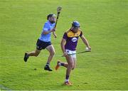 21 July 2021; Daragh Murphy of Wexford in action against Dara Kennedy of Dublin during the Electric Ireland Leinster GAA Minor Hurling Championship Semi-Final match between Dublin and Wexford at Chadwicks Wexford Park in Wexford. Photo by Daire Brennan/Sportsfile