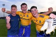 21 July 2021; Roscommon players, from left, Cathal Feely, Keith Doyle, and Tomas Crean celebrate after their side's victory in the EirGrid Connacht GAA Football U20 Championship Final match between Mayo and Roscommon at Elverys MacHale Park in Castlebar, Mayo. Photo by Piaras Ó Mídheach/Sportsfile
