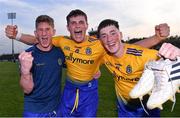 21 July 2021; Roscommon players, from left, Cathal Feely, Keith Doyle, and Tomas Crean celebrate after their side's victory in the EirGrid Connacht GAA Football U20 Championship Final match between Mayo and Roscommon at Elverys MacHale Park in Castlebar, Mayo. Photo by Piaras Ó Mídheach/Sportsfile