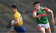 21 July 2021; Ben O'Carroll of Roscommon in action against Ethan Henry of Mayo during the EirGrid Connacht GAA Football U20 Championship Final match between Mayo and Roscommon at Elverys MacHale Park in Castlebar, Mayo. Photo by Piaras Ó Mídheach/Sportsfile