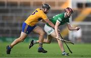 19 July 2021; Ronan Fox of Limerick and Darragh Healy of Clare during the Munster GAA Hurling U20 Championship semi-final match between Limerick and Clare at the LIT Gaelic Grounds in Limerick. Photo by Ben McShane/Sportsfile