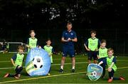 22 July 2021; Republic of Ireland manager Stephen Kenny with, from left, Dylan Keane, Abbie Catiner, Taaffe, Jamie Coleman, Luke Doyle, Holly Farrell and Jack Linehan during a visit to the INTERSPORT Elverys Summer Soccer Schools at Templeogue United FC in Dublin. Photo by Eóin Noonan/Sportsfile