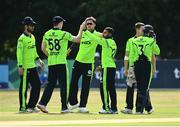 22 July 2021; Simi Singh of Ireland, centre, is congratulated by team-mates after bowling out Quinton de Kock of South Africa due to an LBW during the Men's T20 International match between Ireland and South Africa at Stormont in Belfast. Photo by David Fitzgerald/Sportsfile