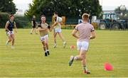 22 July 2021; Offaly players warm up before the EirGrid Leinster GAA Football U20 Championship Final match between Dublin and Offaly at MW Hire O'Moore Park in Portlaoise, Laois. Photo by Matt Browne/Sportsfile