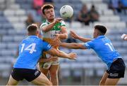 22 July 2021; Fionn Dempsey of Offaly in action against Luke Swan and Lorcan O'Dell of Dublin during the EirGrid Leinster GAA Football U20 Championship Final match between Dublin and Offaly at MW Hire O'Moore Park in Portlaoise, Laois. Photo by Matt Browne/Sportsfile