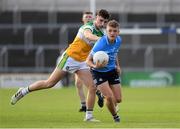 22 July 2021; Mark L'Estrange of Dublin in action against Morgan Tynan of Offaly during the EirGrid Leinster GAA Football U20 Championship Final match between Dublin and Offaly at MW Hire O'Moore Park in Portlaoise, Laois. Photo by Matt Browne/Sportsfile