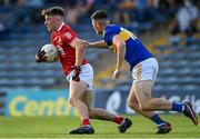 22 July 2021; Colm O'Donovan of Cork in action against Seán O'Connor of Tipperary during the EirGrid Munster GAA Football U20 Championship Final match between Cork and Tipperary at Semple Stadium in Thurles, Tipperary. Photo by Piaras Ó Mídheach/Sportsfile