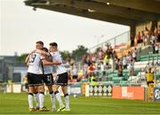 22 July 2021; David McMillan of Dundalk celebrates with team-mates Daniel Kelly and Darragh Leahy after scoring his side's second goal during the UEFA Europa Conference League second qualifying round first leg match between Dundalk and Levadia at Tallaght Stadium in Dublin. Photo by Eóin Noonan/Sportsfile