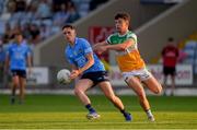 22 July 2021; Mark Lavin of Dublin in action against Fionn Dempsey of Offaly during the EirGrid Leinster GAA Football U20 Championship Final match between Dublin and Offaly at MW Hire O'Moore Park in Portlaoise, Laois. Photo by Matt Browne/Sportsfile