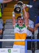 22 July 2021; Offaly captain Cathal Donoghue lifts the cup after the EirGrid Leinster GAA Football U20 Championship Final match between Dublin and Offaly at MW Hire O'Moore Park in Portlaoise, Laois. Photo by Matt Browne/Sportsfile