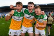 22 July 2021; Offaly players from left Ed Cullen, Cathal Donoghue and Mikey Cunningham celebrate after the EirGrid Leinster GAA Football U20 Championship Final match between Dublin and Offaly at MW Hire O'Moore Park in Portlaoise, Laois. Photo by Matt Browne/Sportsfile
