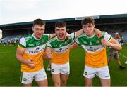 22 July 2021; Offaly players from left Oisin Keenan Martin, Cathal Ryan and Tom Hyland celebrate after the EirGrid Leinster GAA Football U20 Championship Final match between Dublin and Offaly at MW Hire O'Moore Park in Portlaoise, Laois. Photo by Matt Browne/Sportsfile