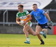 22 July 2021; Keith O'Neill of Offaly in action against Rory Dwyer of Dublin during the EirGrid Leinster GAA Football U20 Championship Final match between Dublin and Offaly at MW Hire O'Moore Park in Portlaoise, Laois. Photo by Matt Browne/Sportsfile