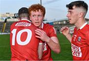 22 July 2021; Diarmuid Phelan of Cork, centre, celebrates with team-mates Conor Corbett, left, and Colm O'Donovan after after his side's victory in the EirGrid Munster GAA Football U20 Championship Final match between Cork and Tipperary at Semple Stadium in Thurles, Tipperary. Photo by Piaras Ó Mídheach/Sportsfile