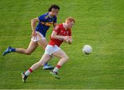 22 July 2021; Jack Cahalane of Cork in action against Tadhg Condon of Tipperary during the EirGrid Munster GAA Football U20 Championship Final match between Cork and Tipperary at Semple Stadium in Thurles, Tipperary. Photo by Piaras Ó Mídheach/Sportsfile