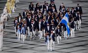 23 July 2021; Team Argentina flagbearers Cecilia Carranza Saroli and Santiago Raul Lange carry the Argentian flag during the 2020 Tokyo Summer Olympic Games opening ceremony at the Olympic Stadium in Tokyo, Japan. Photo by Stephen McCarthy/Sportsfile