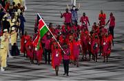 23 July 2021; Team Kenya flagbearers Mercy Moim and Andrew Amonde carry the Kenyan flag during the 2020 Tokyo Summer Olympic Games opening ceremony at the Olympic Stadium in Tokyo, Japan. Photo by Stephen McCarthy/Sportsfile