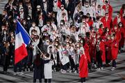 23 July 2021; France flagbearers Clarisse Agbegnou and Samir Ait Said carry the France flag during the 2020 Tokyo Summer Olympic Games opening ceremony at the Olympic Stadium in Tokyo, Japan. Photo by Stephen McCarthy/Sportsfile