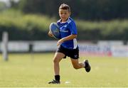 23 July 2021; Oisin Kirwam, age 8, in action during the Bank of Ireland Leinster Rugby Summer Camp at Portlaoise RFC in Portlaoise, Laois. Photo by Matt Browne/Sportsfile