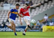 22 July 2021; David Buckley of Cork shoots under pressure from Cathal Deeley of Tipperary during the EirGrid Munster GAA Football U20 Championship Final match between Cork and Tipperary at Semple Stadium in Thurles, Tipperary. Photo by Piaras Ó Mídheach/Sportsfile