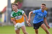 22 July 2021; Oisin Keenan Martin of Offaly in action against David O'Dowd of Dublin during the EirGrid Leinster GAA Football U20 Championship Final match between Dublin and Offaly at MW Hire O'Moore Park in Portlaoise, Laois. Photo by Matt Browne/Sportsfile