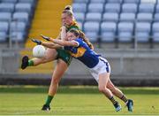 23 July 2021; Vikki Wall of Meath kicks a point despite the attempts of Maria Curley of Tipperary during the TG4 All-Ireland Senior Ladies Football Championship Group 2 Round 3 match between Meath and Tipperary at MW Hire O'Moore Park in Portlaoise, Co Laois. Photo by Matt Browne/Sportsfile