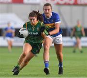 23 July 2021; Emma Troy of Meath in action against Orla O'Dwyer of Tipperary during the TG4 All-Ireland Senior Ladies Football Championship Group 2 Round 3 match between Meath and Tipperary at MW Hire O'Moore Park in Portlaoise, Co Laois. Photo by Matt Browne/Sportsfile *