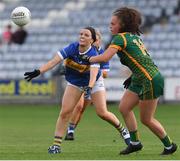 23 July 2021; Roisin Howard of Tipperary in action against Emma Duggan of Meath during the TG4 All-Ireland Senior Ladies Football Championship Group 2 Round 3 match between Meath and Tipperary at MW Hire O'Moore Park in Portlaoise, Co Laois. Photo by Matt Browne/Sportsfile *