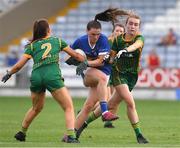 23 July 2021; Ava Fennessy of Tipperary in action against Emma Troy and Mary Kate Lynch of Meath during the TG4 All-Ireland Senior Ladies Football Championship Group 2 Round 3 match between Meath and Tipperary at MW Hire O'Moore Park in Portlaoise, Co Laois. Photo by Matt Browne/Sportsfile *