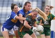 23 July 2021; Monica McGuirk of Meath in action against Cliona O'Dwyer and Caitlin Kennedy of Tipperary during the TG4 All-Ireland Senior Ladies Football Championship Group 2 Round 3 match between Meath and Tipperary at MW Hire O'Moore Park in Portlaoise, Co Laois. Photo by Matt Browne/Sportsfile *