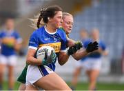 23 July 2021; Lucy Spillane of Tipperary in action against Megan Thynne of Meath during the TG4 All-Ireland Senior Ladies Football Championship Group 2 Round 3 match between Meath and Tipperary at MW Hire O'Moore Park in Portlaoise, Co Laois. Photo by Matt Browne/Sportsfile *