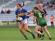 23 July 2021; Caitlin Kennedy of Tipperary in action against Stacey Grimes of Meath during the TG4 All-Ireland Senior Ladies Football Championship Group 2 Round 3 match between Meath and Tipperary at MW Hire O'Moore Park in Portlaoise, Co Laois. Photo by Matt Browne/Sportsfile *